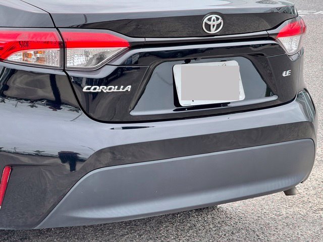 Used 2025 Midnight Black Metallic Toyota LE image 7
