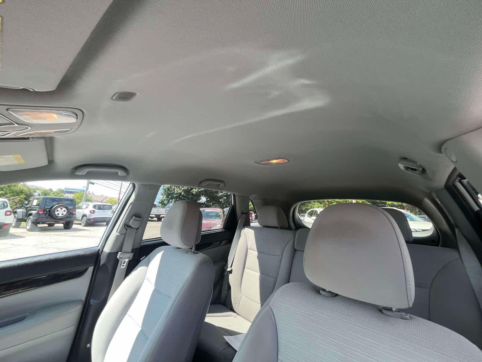 Used 2015 Bright Silver Kia LX image 6