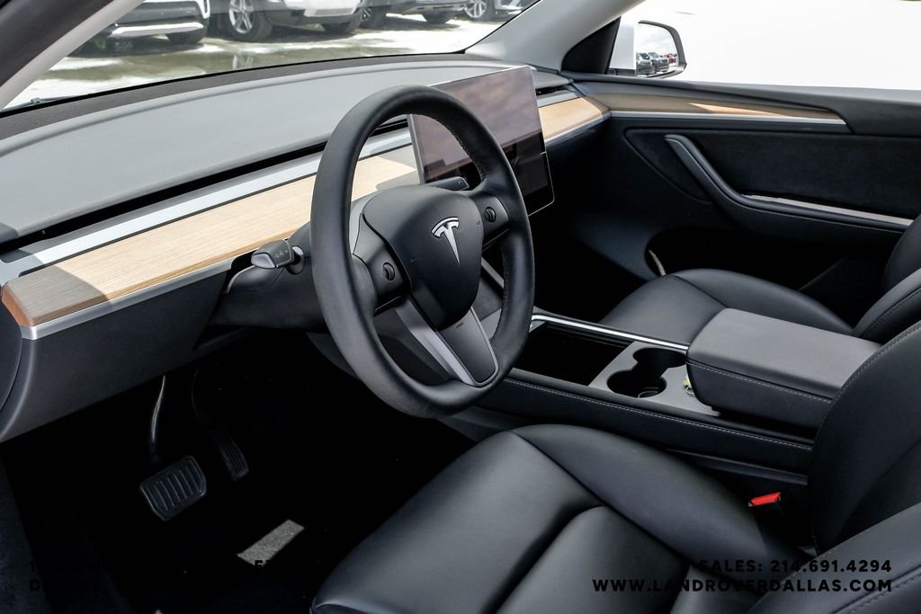 Used 2023 Tesla Model Y Long Range with VIN 7SAYGDEE9PA120692 for sale in Dallas, TX