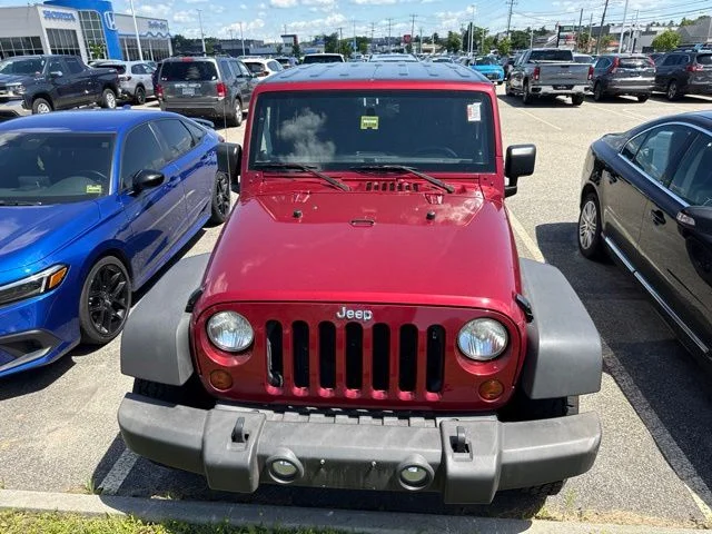 Used 2013 Deep Cherry Red Crystal Jeep Sport image 6