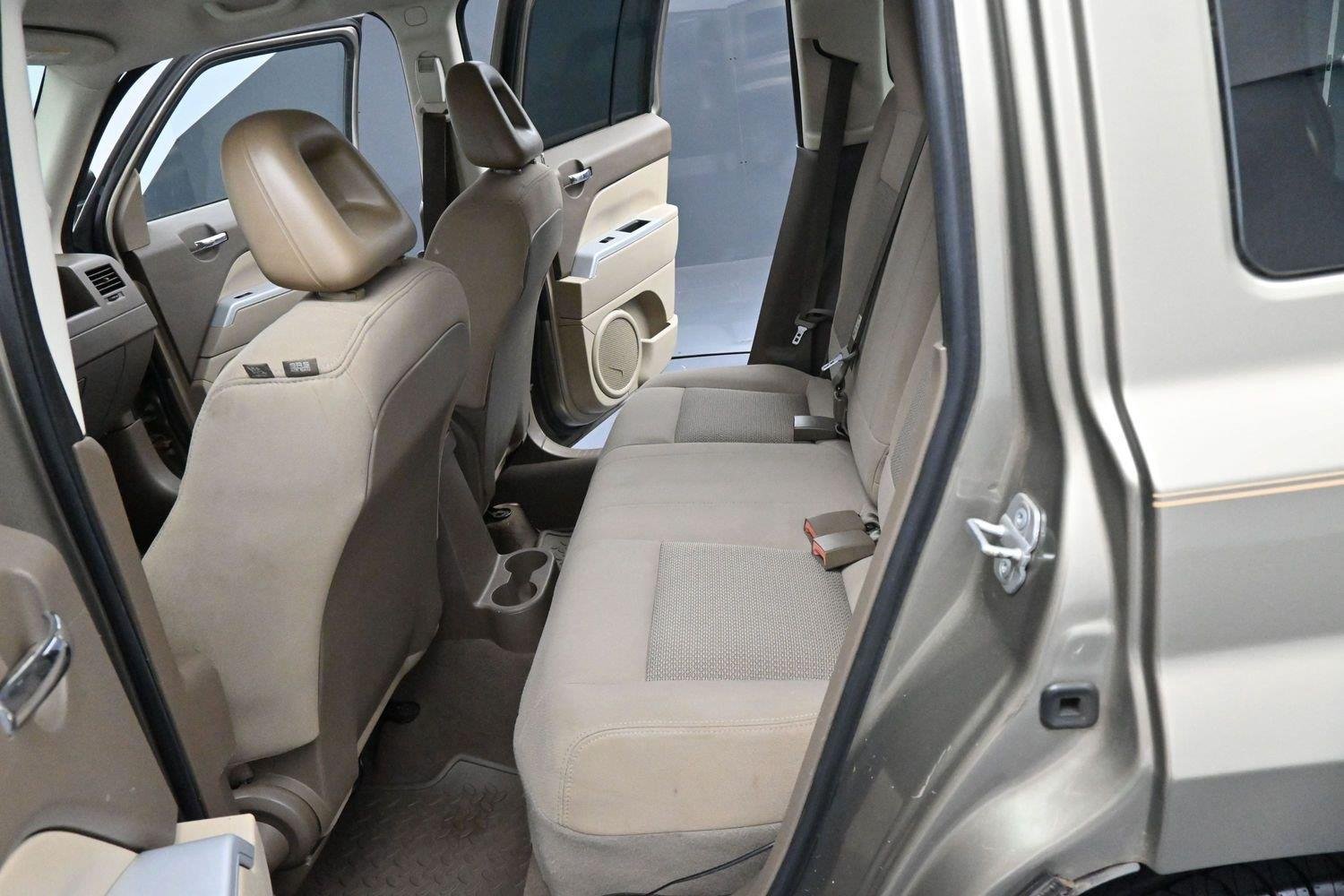 Used 2008 Light Khaki Metallic Jeep Sport image 21