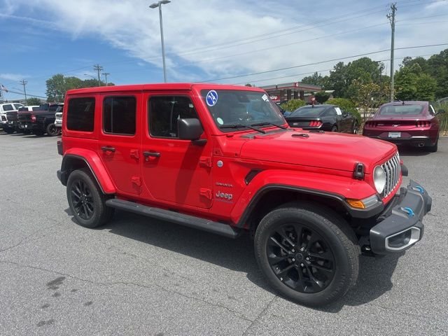 Used 2024 Red Jeep Sahara 4xe image 1