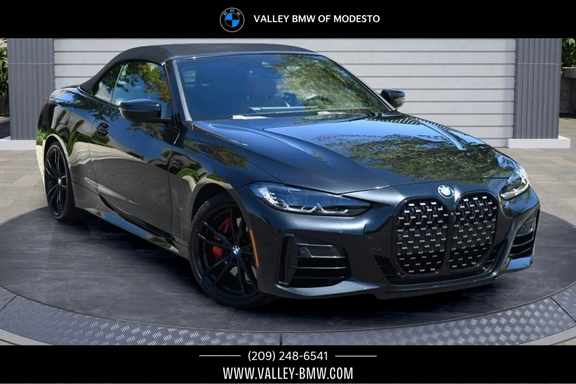 Certified Used 2024 Black Sapphire Metallic BMW M440i image 1
