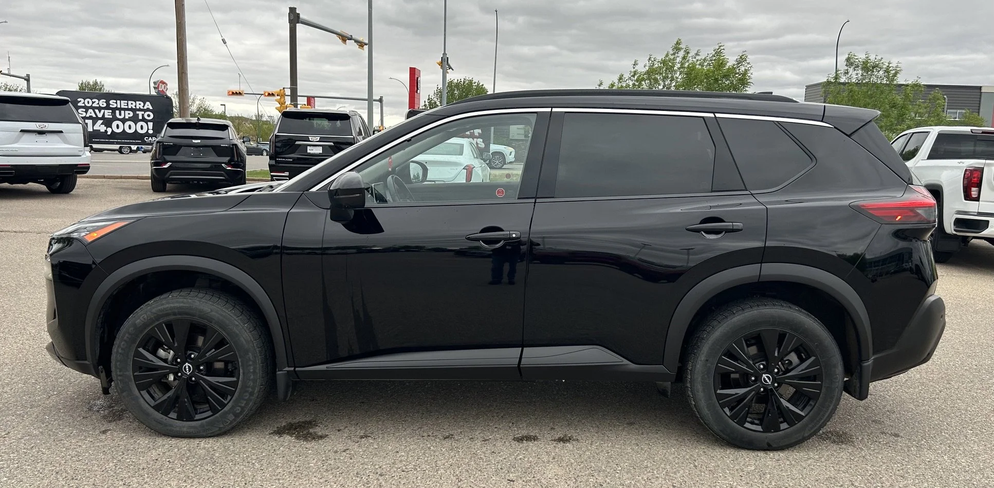 Used 2023 Black Nissan SV Moonroof image 2