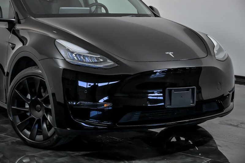 Used 2022 Tesla Model Y Long Range with VIN 7SAYGDEE2NA016395 for sale in Aurora, IL