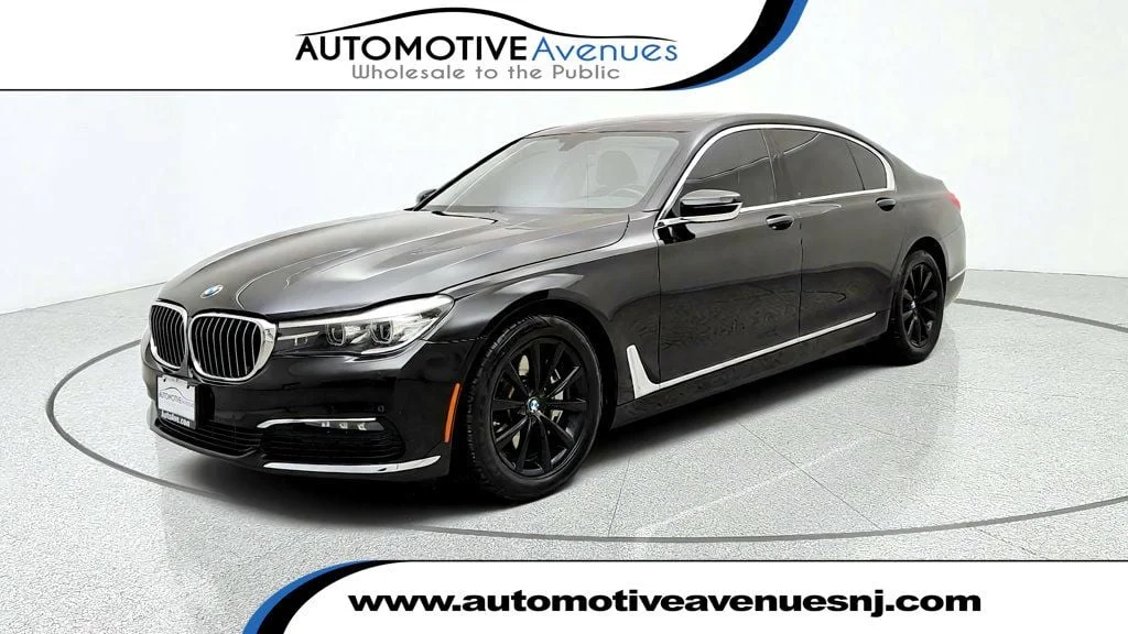 Used 2018 Black Sapphire Metallic BMW 740i xDrive image 1