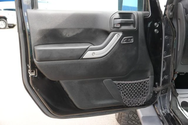 Used 2018 Black Jeep Unlimited Sahara image 12