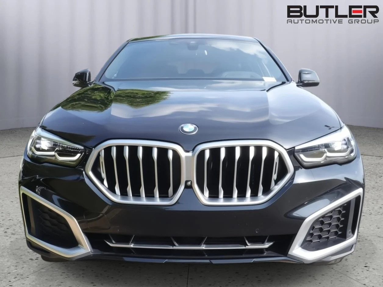 Used 2023 Black Sapphire Metallic BMW xDrive40i image 2