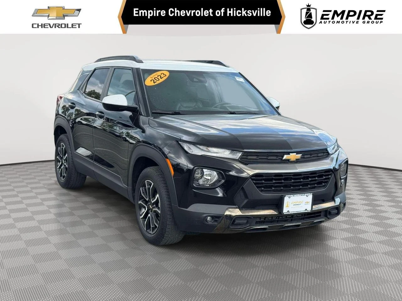 Used 2023 Mosaic Black Metallic Chevrolet FWD ACTIV image 1