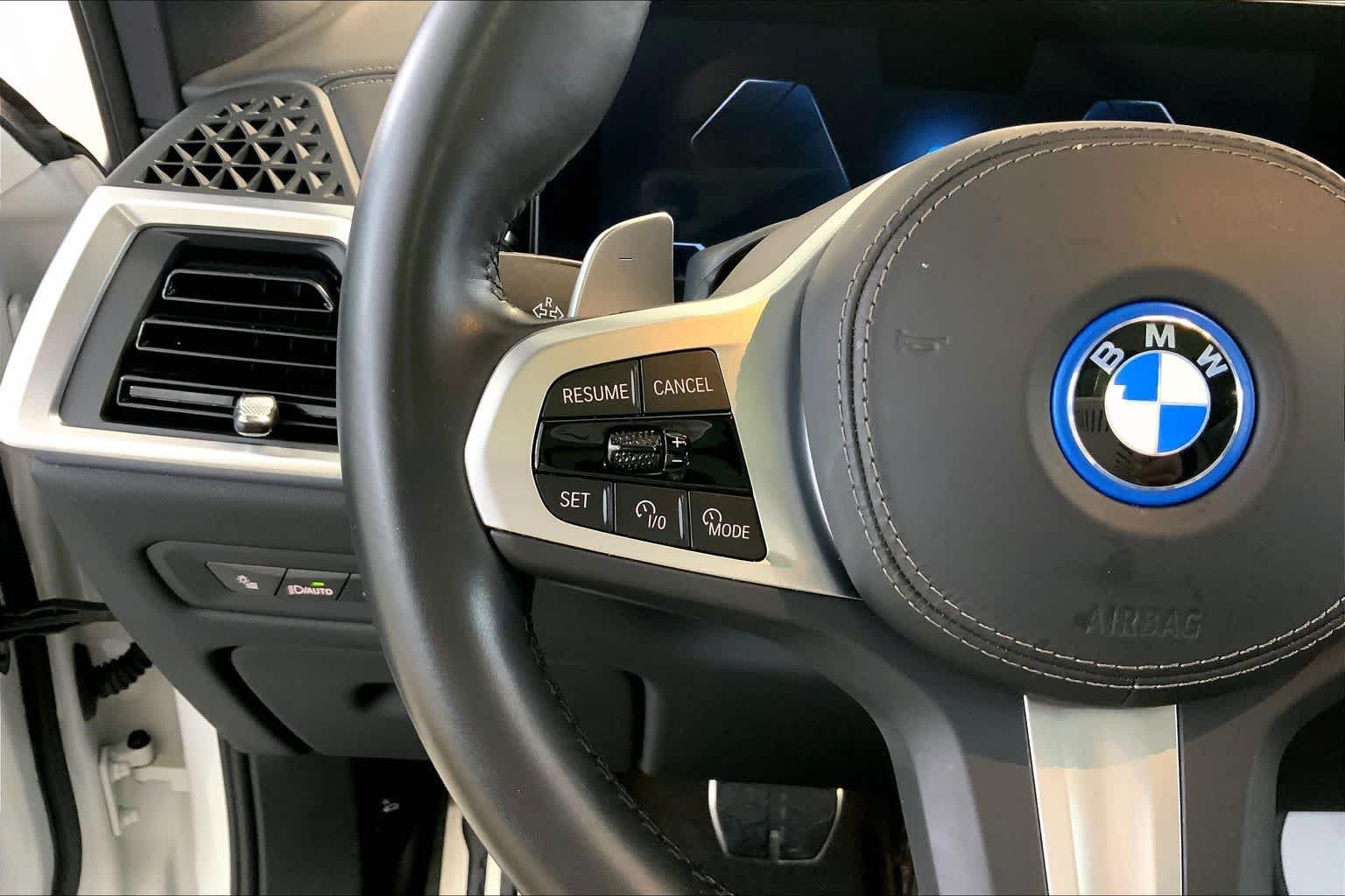 Used 2024 Mineral White Metallic BMW xDrive50e image 23