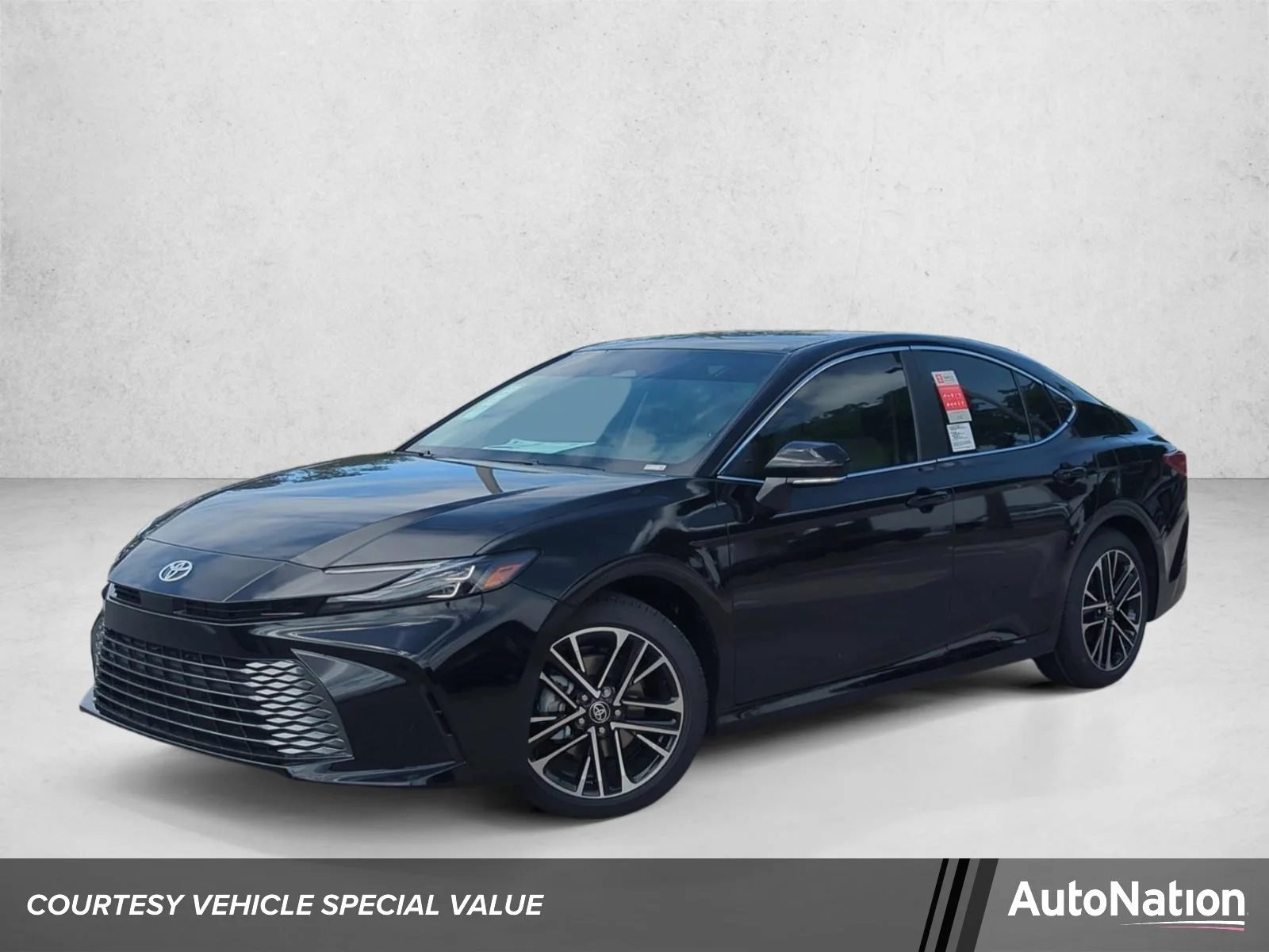 Used 2026 Midnight Black Toyota XLE image 1