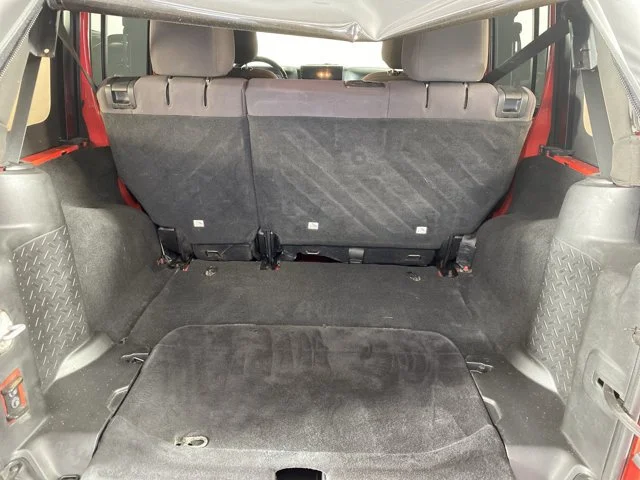 Used 2013 Red Jeep Unlimited Sport image 4
