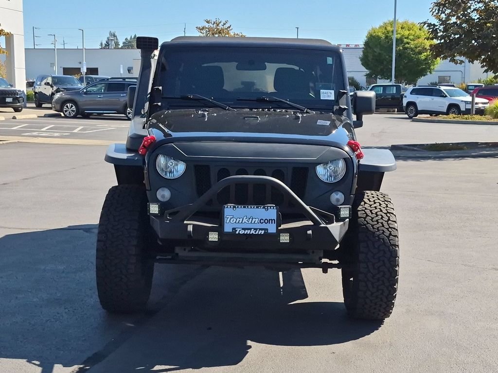 Used 2015 Black Clearcoat Jeep Unlimited Sport image 9
