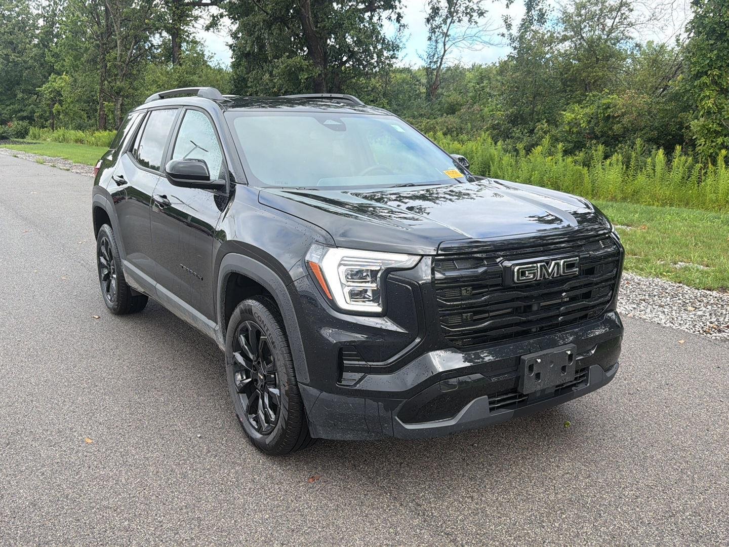 Used 2026 Ebony Twilight Metallic GMC AWD Elevation image 2