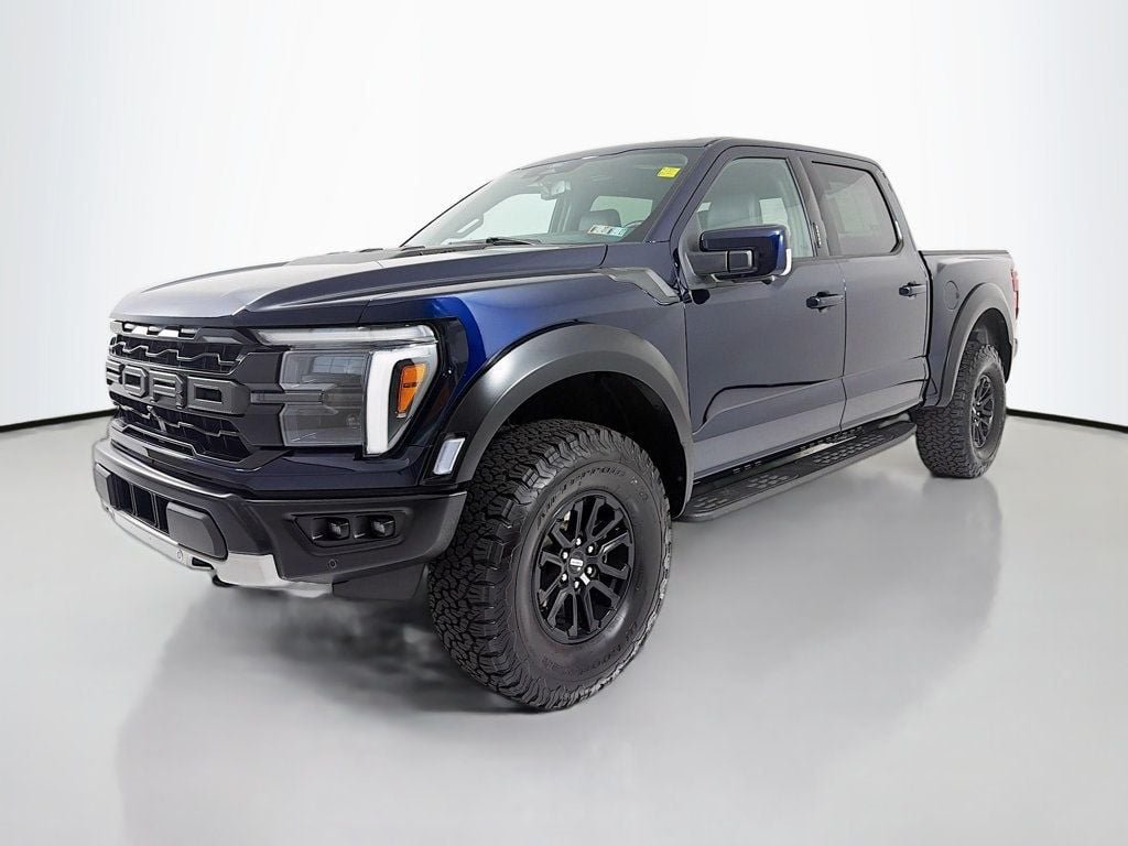 Used 2024 Antimatter Blue Metallic Ford Raptor 4WD SuperCrew 5.5