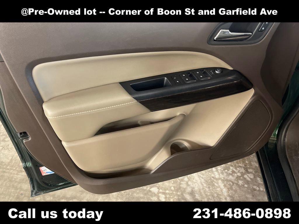 Used 2016 EMERALD GREEN METALLIC GMC 4WD SLT image 15