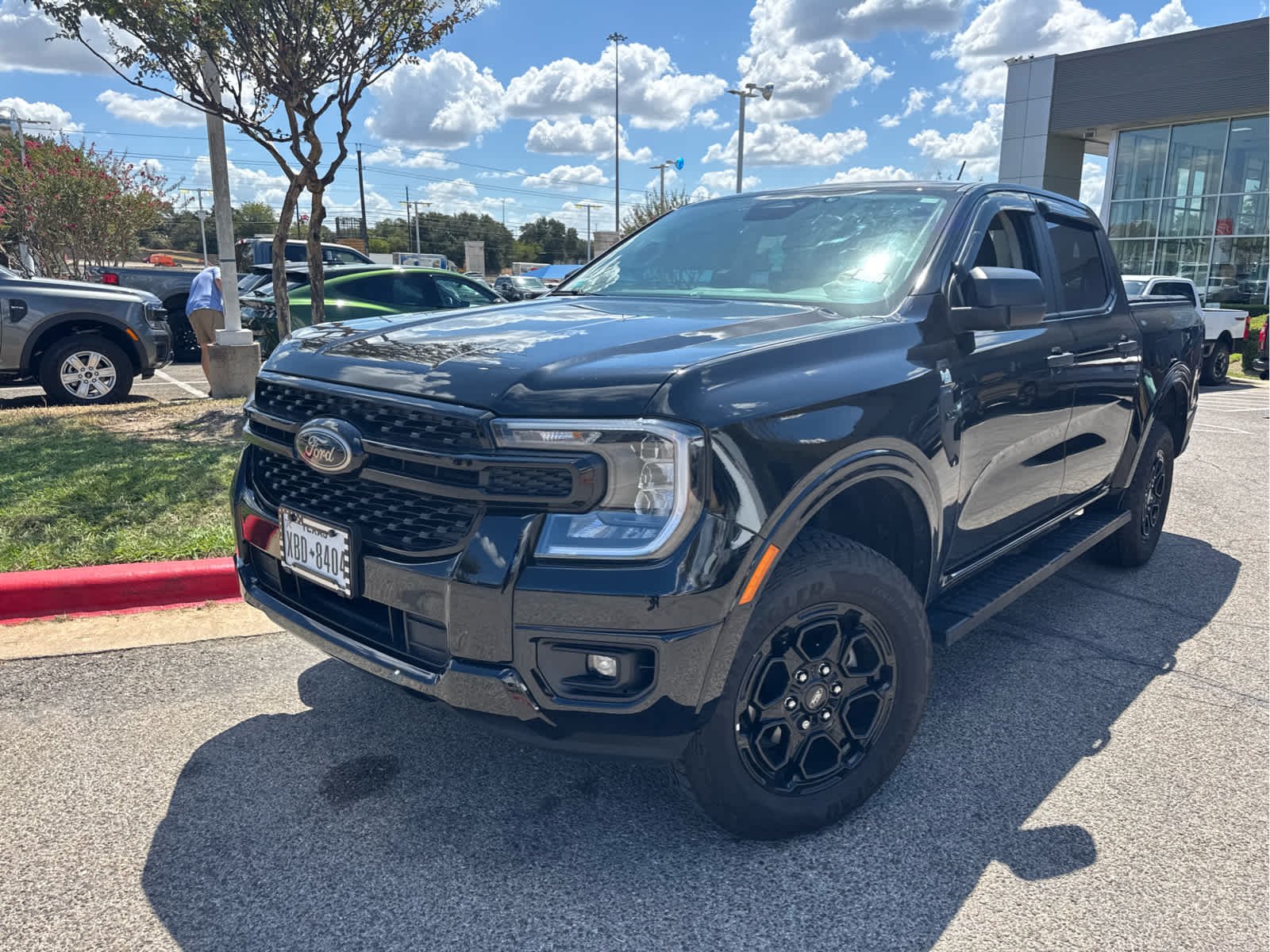 Used 2025 Shadow Black Ford XLT image 2