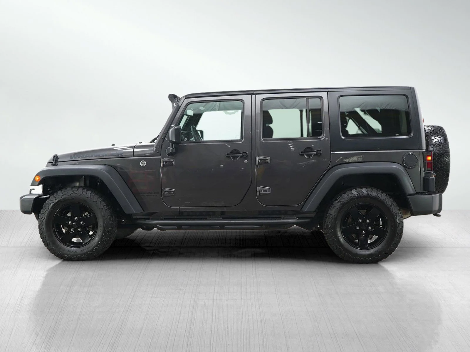 Used 2017 Jeep Wrangler Unlimited Big Bear with VIN 1C4BJWDG1HL666407 for sale in Burnsville, Minnesota