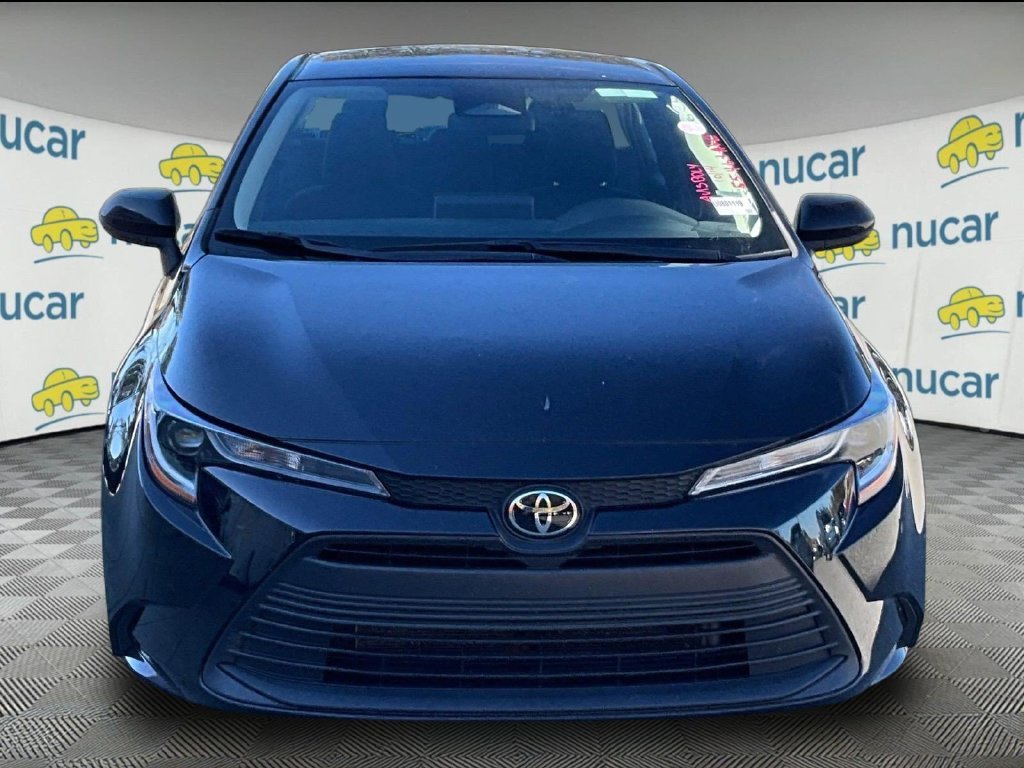 Used 2025 Black Toyota LE image 2