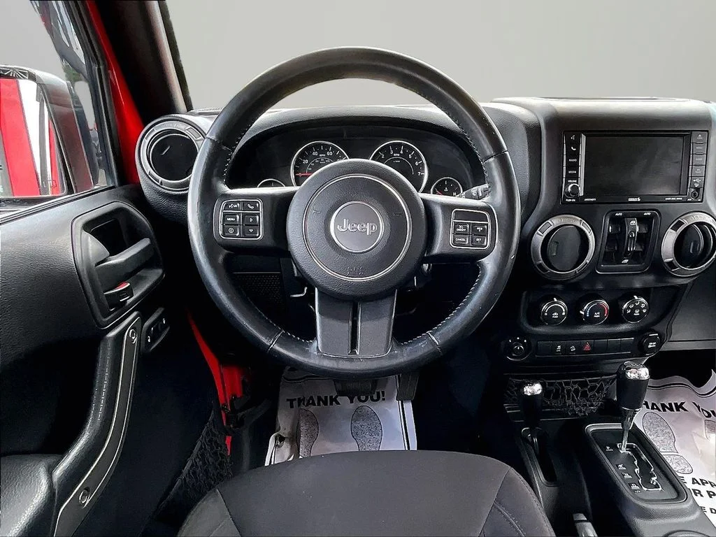 Used 2015 Red Jeep Unlimited Sport image 5