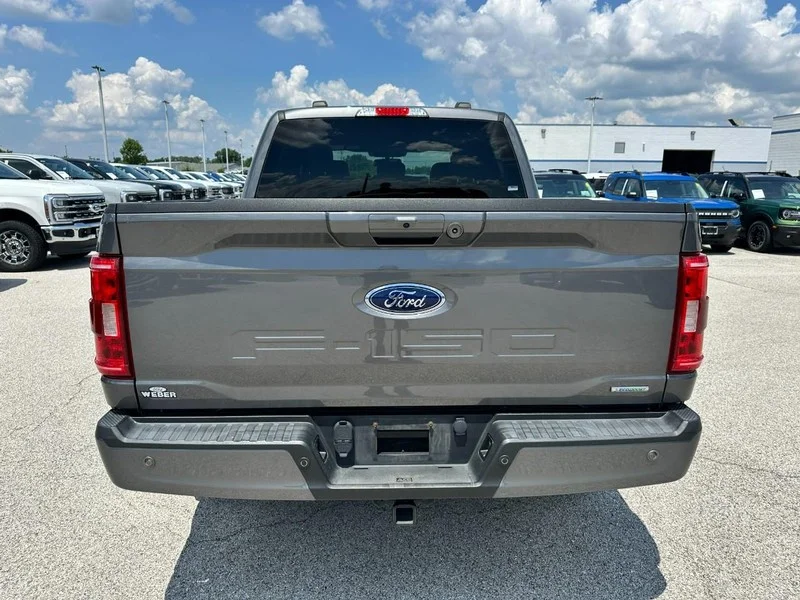 Used 2021 Carbonized Gray Metallic Ford XLT 4WD SuperCrew 5.5