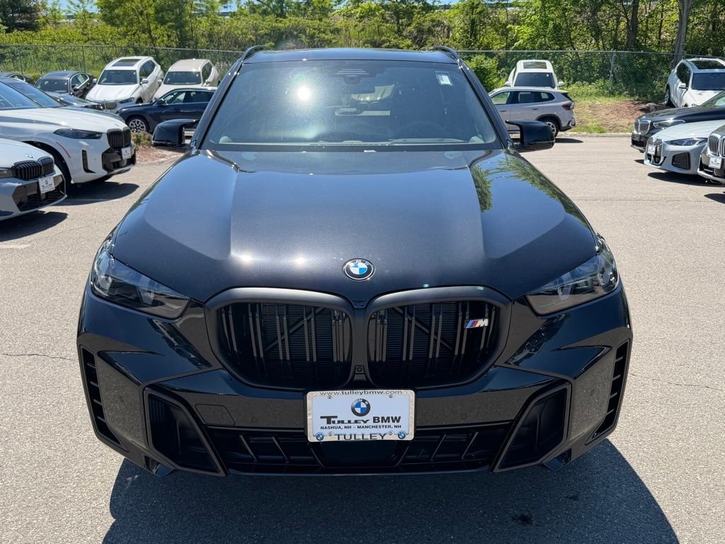 New 2026 Black Sapphire Metallic BMW M60i image 2