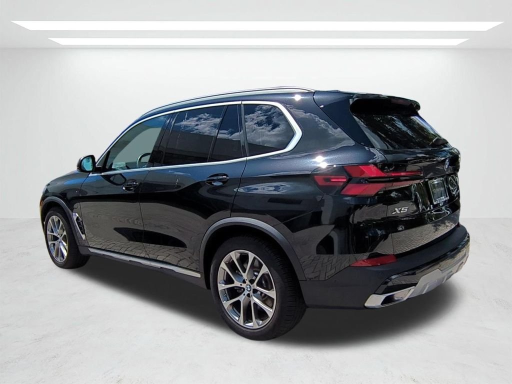 New 2026 Black Sapphire Metallic BMW xDrive50e image 6