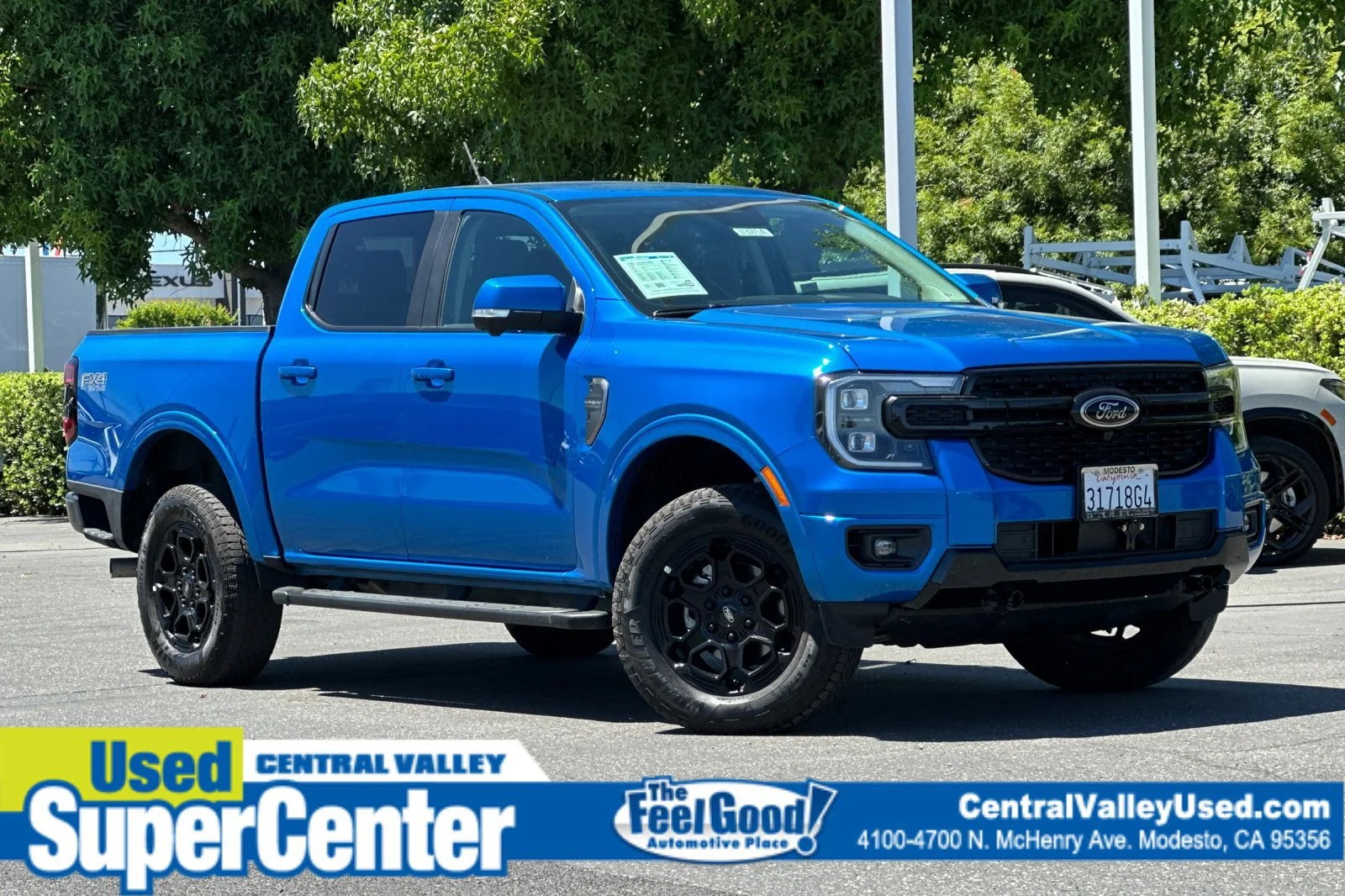 Used 2025 Blue Metallic Ford LARIAT image 1
