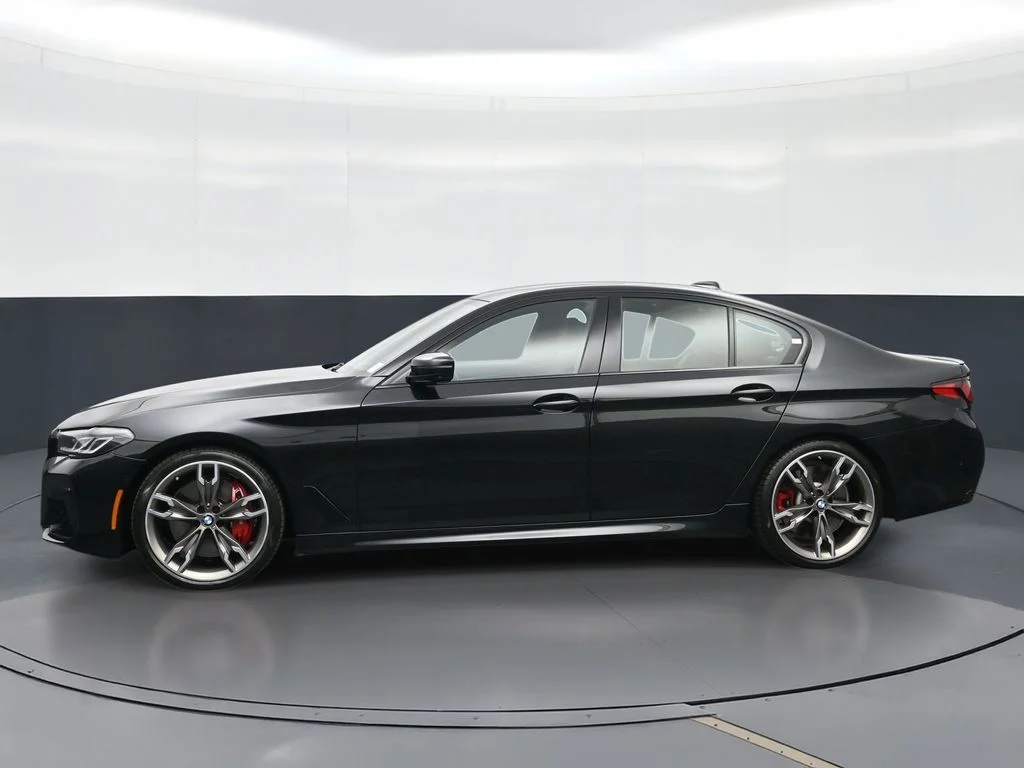 Certified Used 2023 Black Sapphire Metallic BMW M550i xDrive image 5
