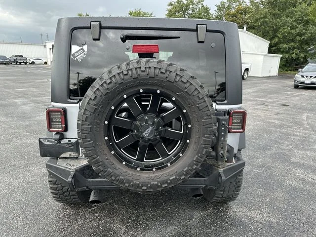 Used 2015 Silver Jeep Unlimited Sport image 23