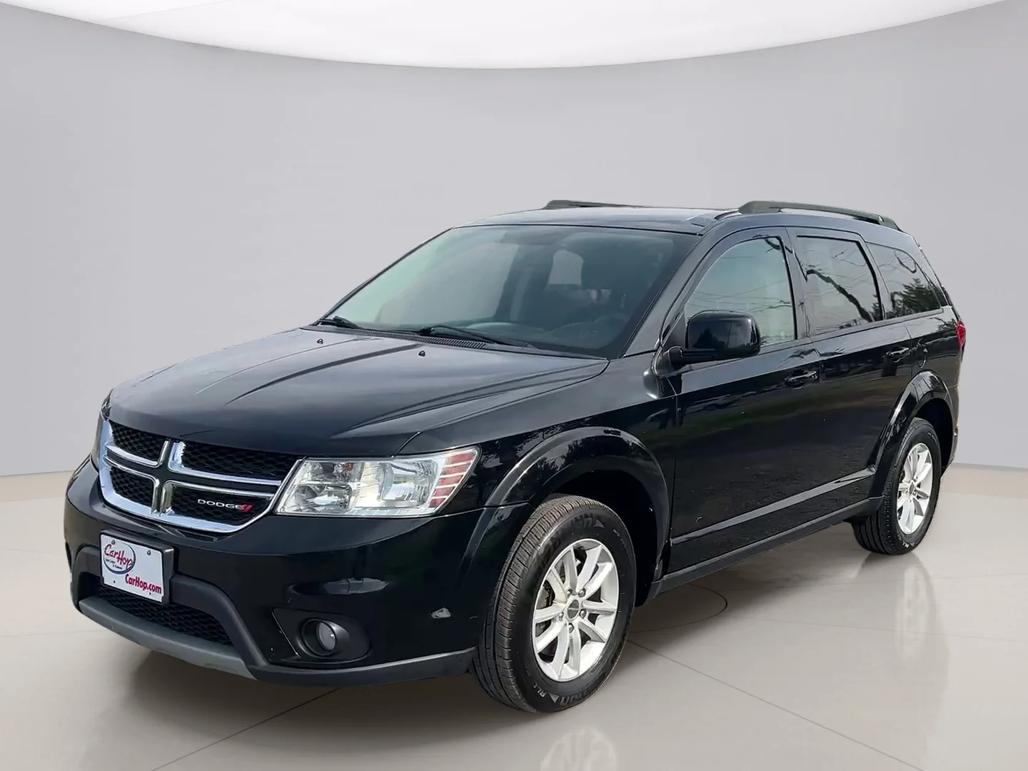 Used 2016 Black Dodge SXT image 1