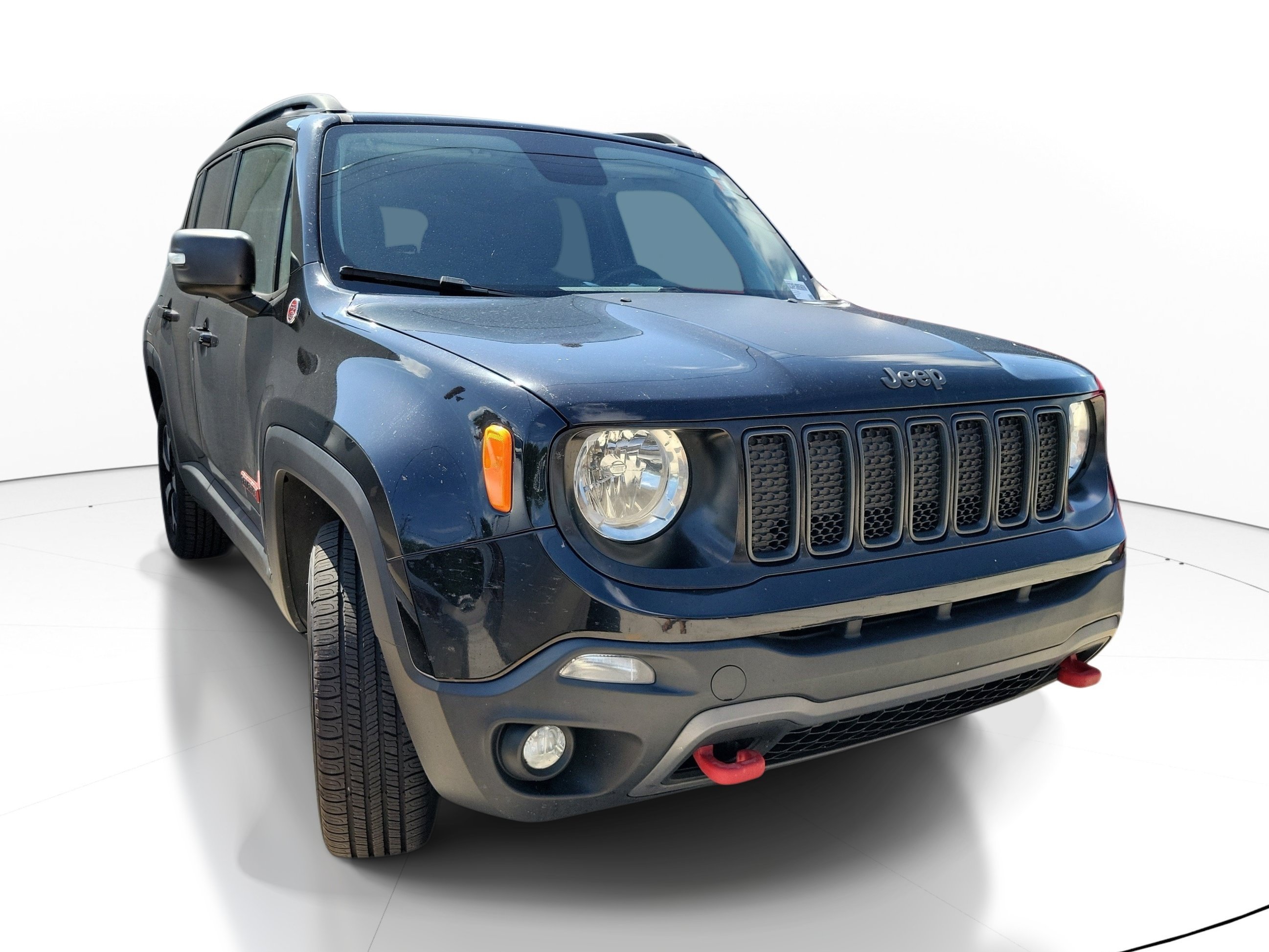 Used 2019 Black Clearcoat Jeep Trailhawk image 1