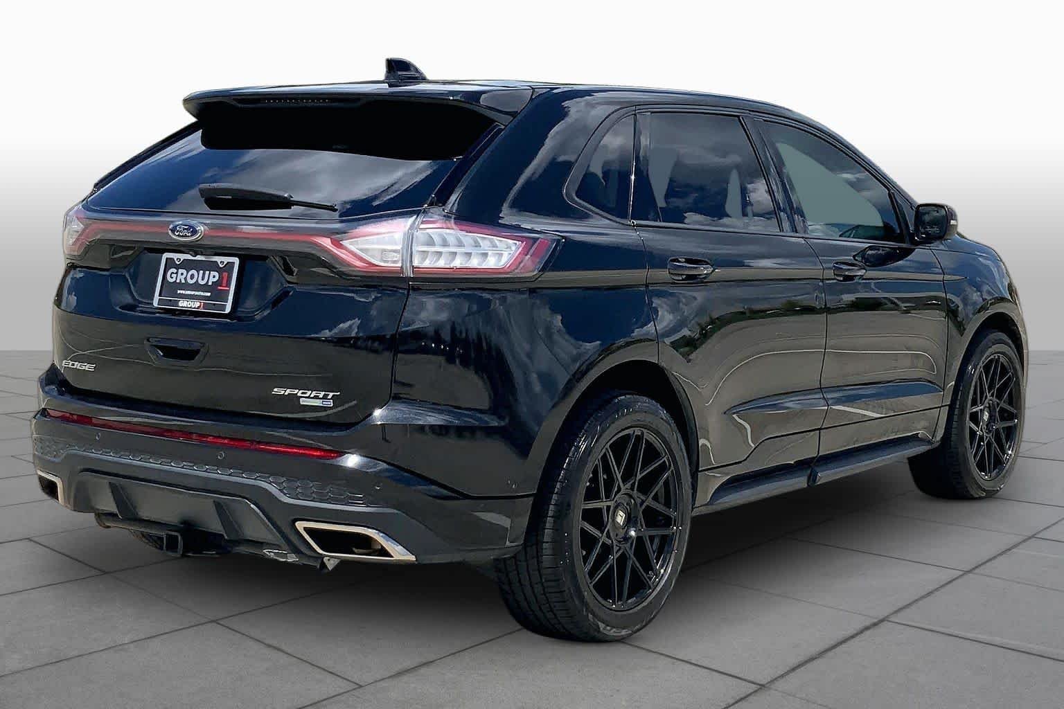 Used 2015 Tuxedo Black Ford Sport image 13