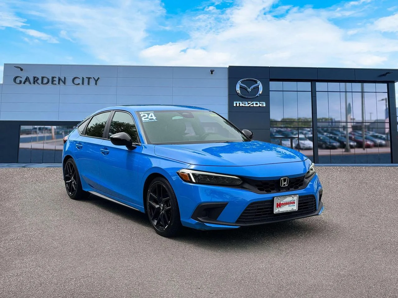 Used 2024 Boost Blue Pearl Honda Sport image 1