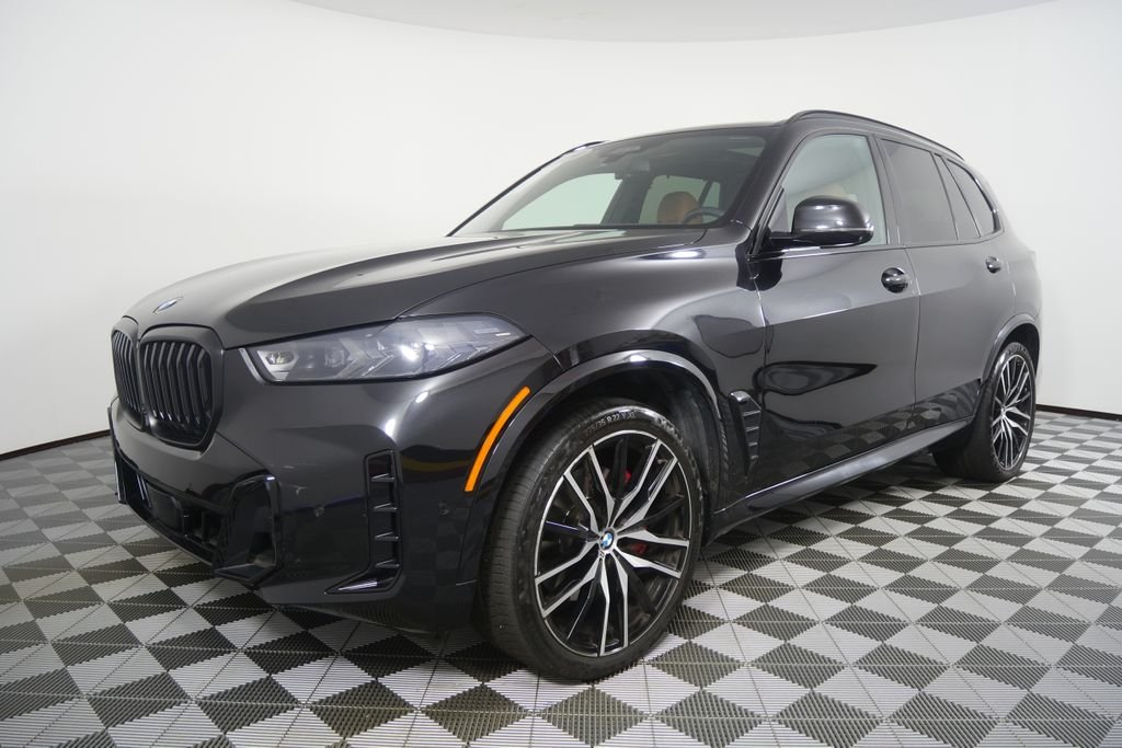 Certified Used 2024 Black Sapphire Metallic BMW xDrive40i image 7