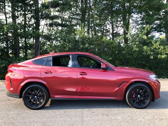 Used 2023 Flamenco Red Metallic BMW xDrive40i image 3