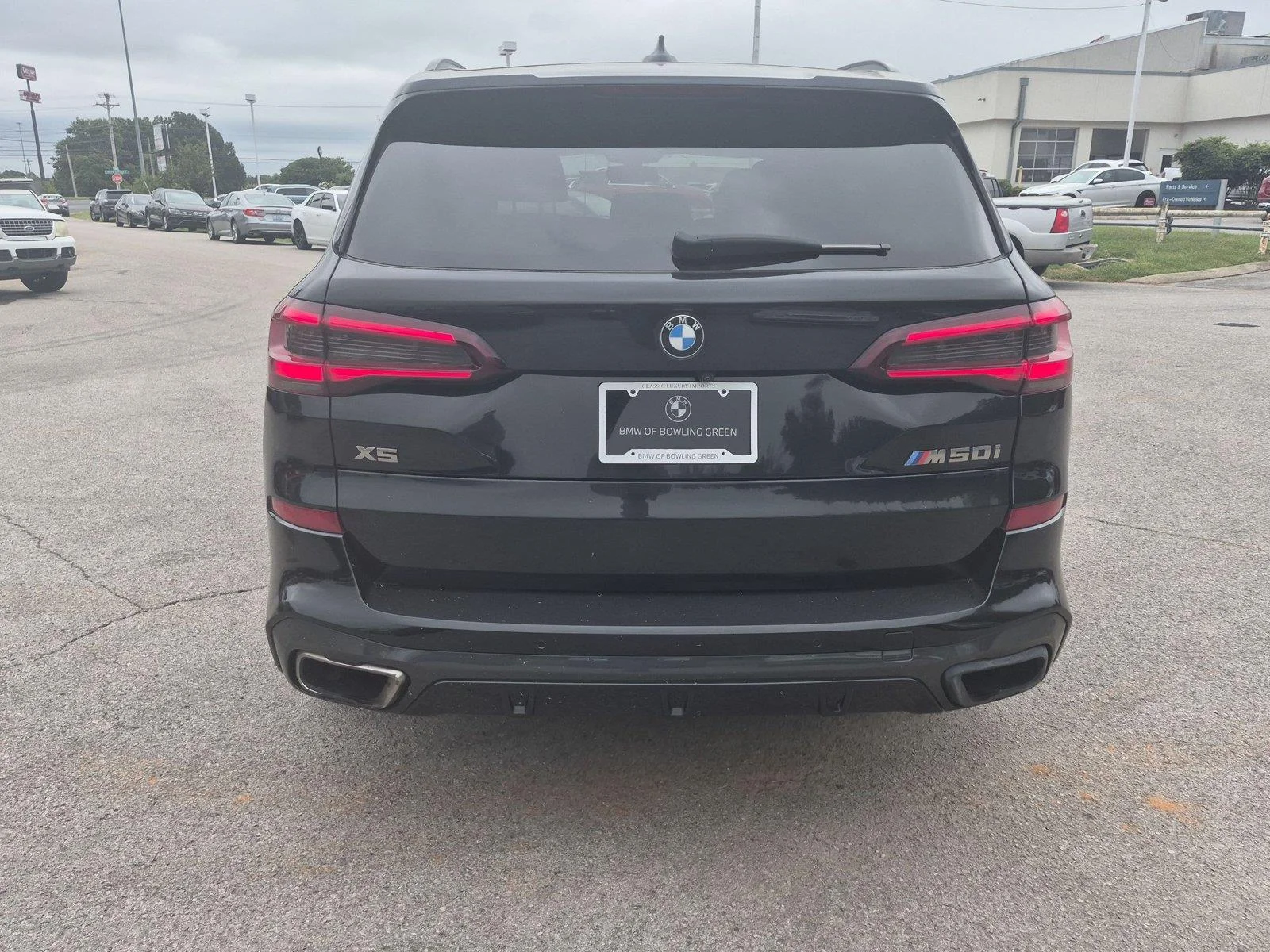 Used 2021 Black Sapphire Metallic BMW M50i image 4