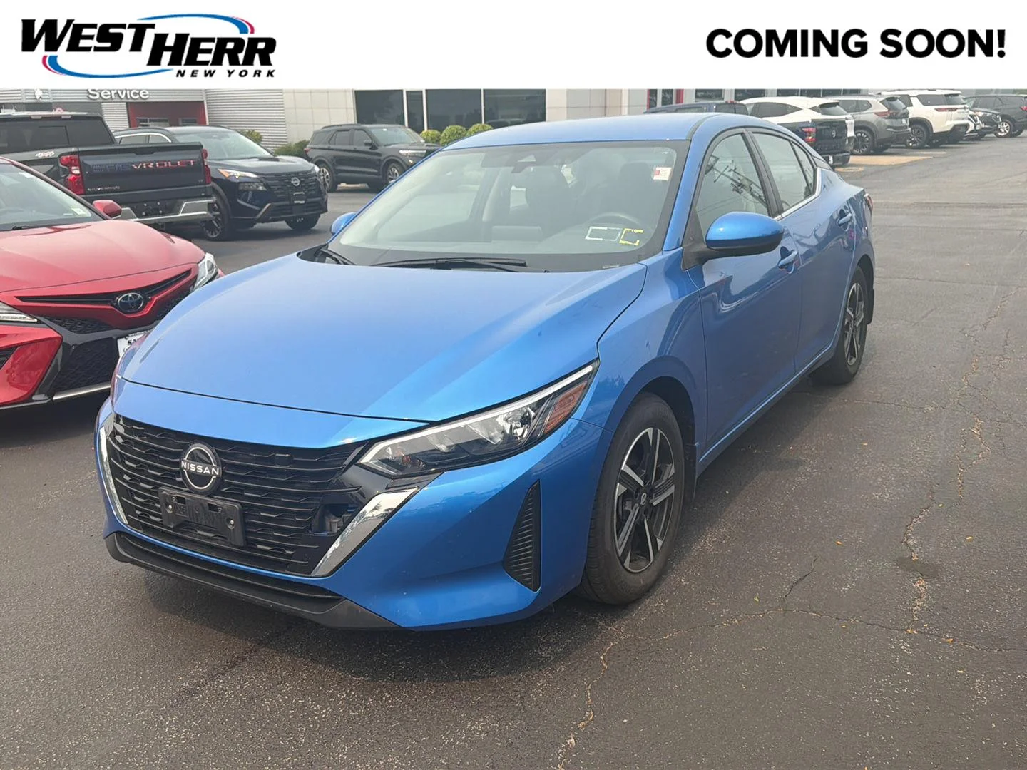 Used 2024 Electric Blue Metallic Nissan SV image 1