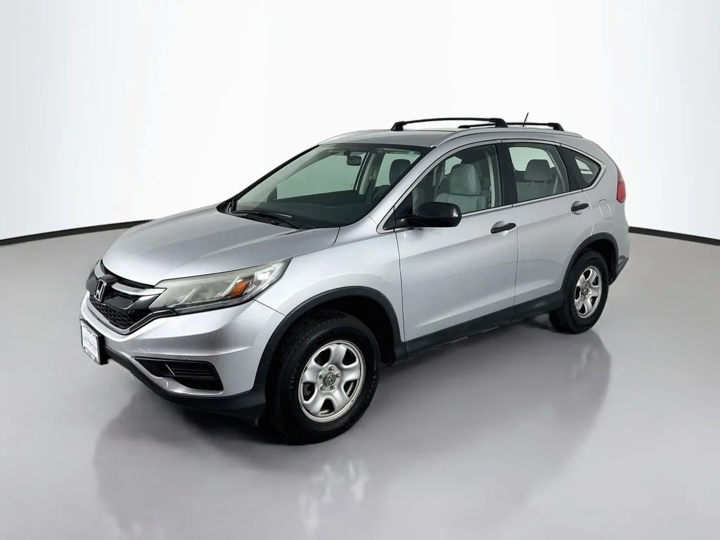 Used 2015 Alabaster Silver Metallic Honda LX image 1
