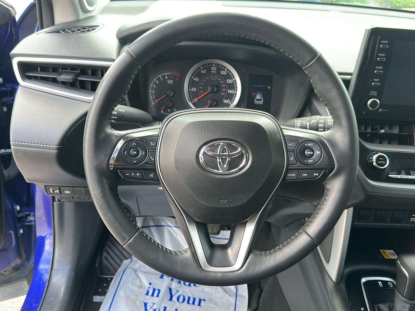 Used 2022 Blue Crush Metallic Toyota LE image 11
