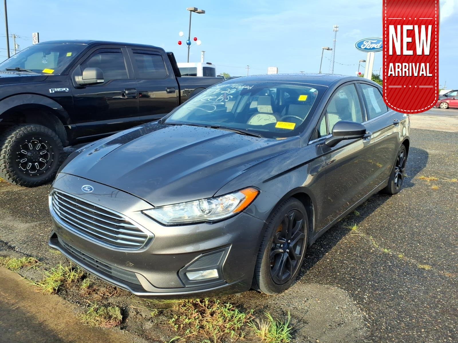 Used 2020 Magnetic Metallic Ford SE image 1
