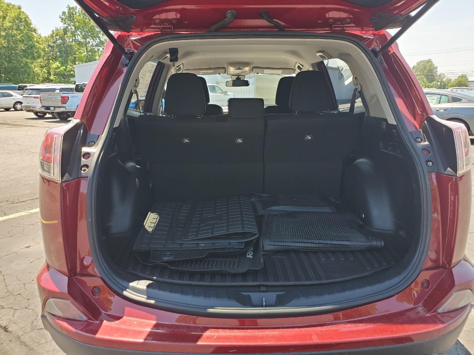 Used 2018 Ruby Flare Pearl Toyota LE image 5