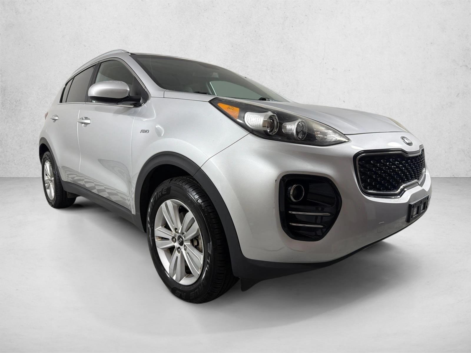 Used 2017 Sparkling Silver Kia LX image 1