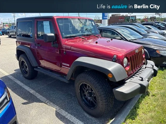 Used 2013 Deep Cherry Red Crystal Jeep Sport image 1