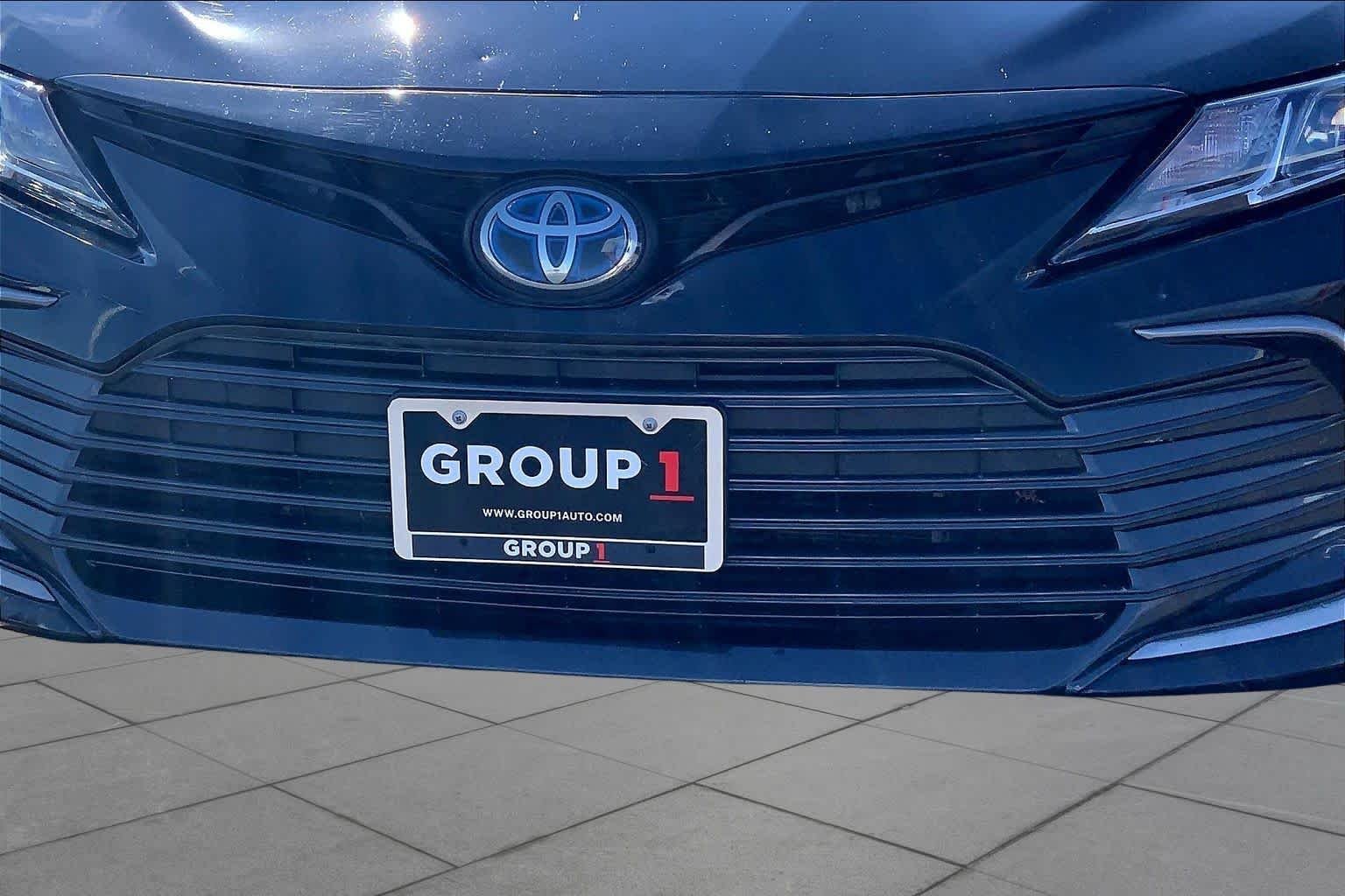 Used 2023 Midnight Black Metallic Toyota Hybrid LE image 30