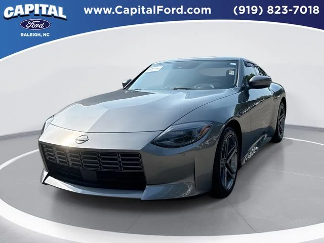 Used 2024 Gray Nissan Sport image 1