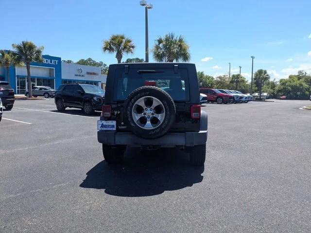 Used 2016 Black Clearcoat Jeep Sport image 4