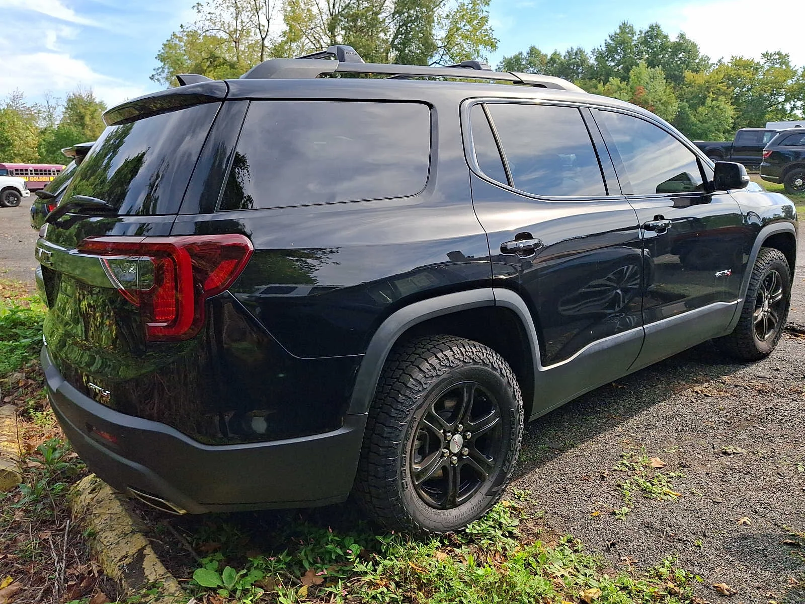 Used 2023 Ebony Twilight Metallic GMC AT4 image 4