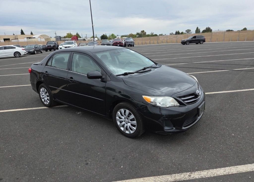 Used 2013 Black Sand Pearl Toyota LE image 2