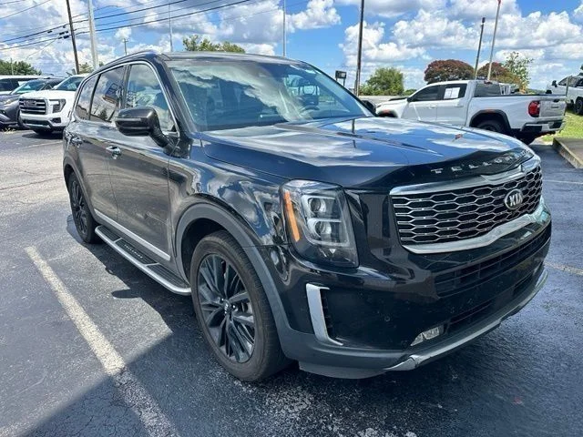Used 2021 Black Kia SX image 1